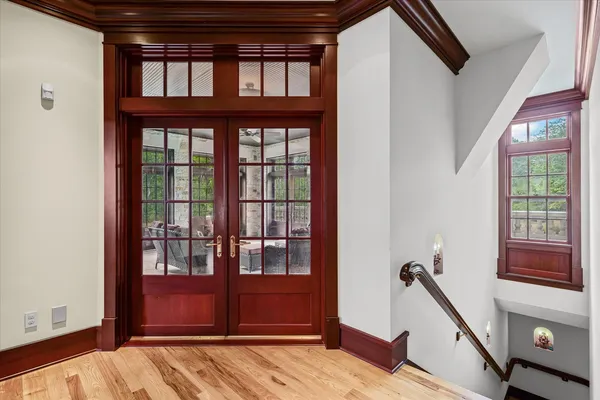 a view of walk in closet and empty room