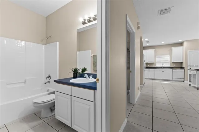 a view of swimming pool with an outdoor space and seating area