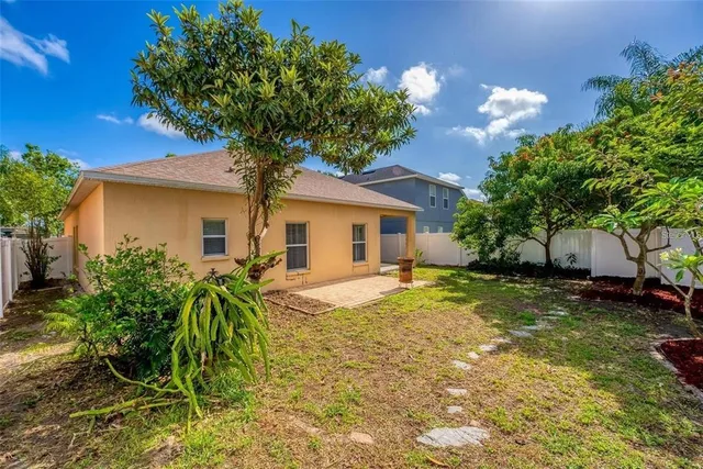 a view of swimming pool with seating area