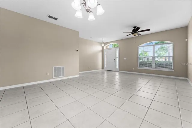 a kitchen with granite countertop cabinets and steel stainless steel appliances