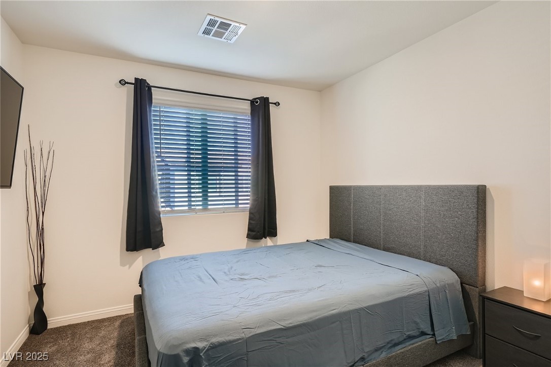 527 Clearsable Avenue Henderson, NV 89044 - Photo 7 of 11 Bedroom featuring carpet and baseboards