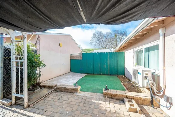 a view of a backyard with garden