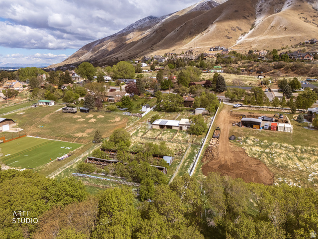 2672 East Canyon Road Springville, UT 84663 - Photo 7 of 33 Aerial view of sparsely populated area featuring a mountain backdrop
