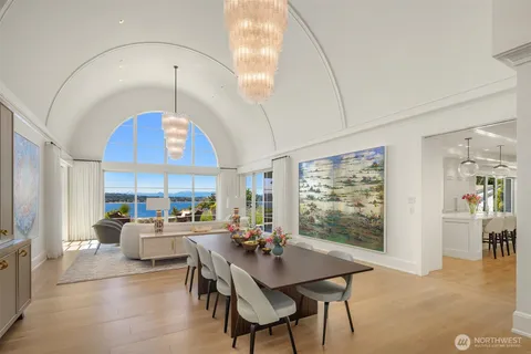 a view of a dining room with furniture window and wooden floor