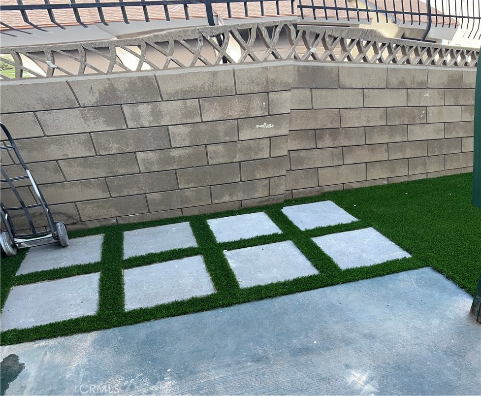 2255 Cahuiila Street, Unit 73 Colton, CA 92324 - Photo 11 of 12 a view of a backyard