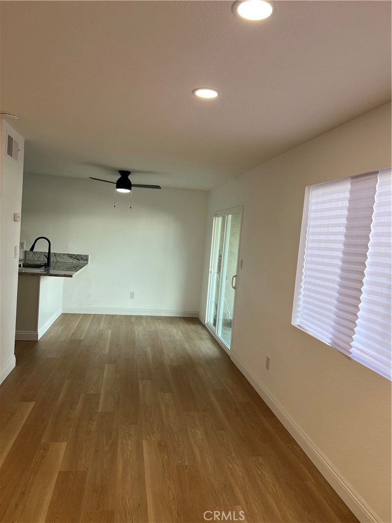 2255 Cahuiila Street, Unit 73 Colton, CA 92324 - Photo 5 of 12 a view of an empty room and window