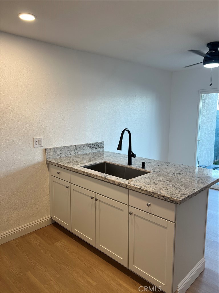 2255 Cahuiila Street, Unit 73 Colton, CA 92324 - Photo 7 of 12 a view with a granite countertop sink