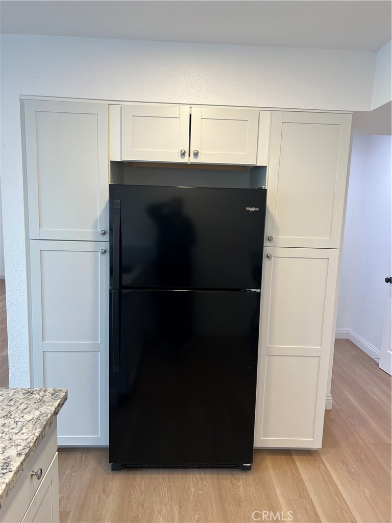 2255 Cahuiila Street, Unit 73 Colton, CA 92324 - Photo 8 of 12 a utility room with washer and dryer