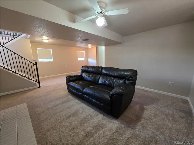 a view of an empty room and closet area