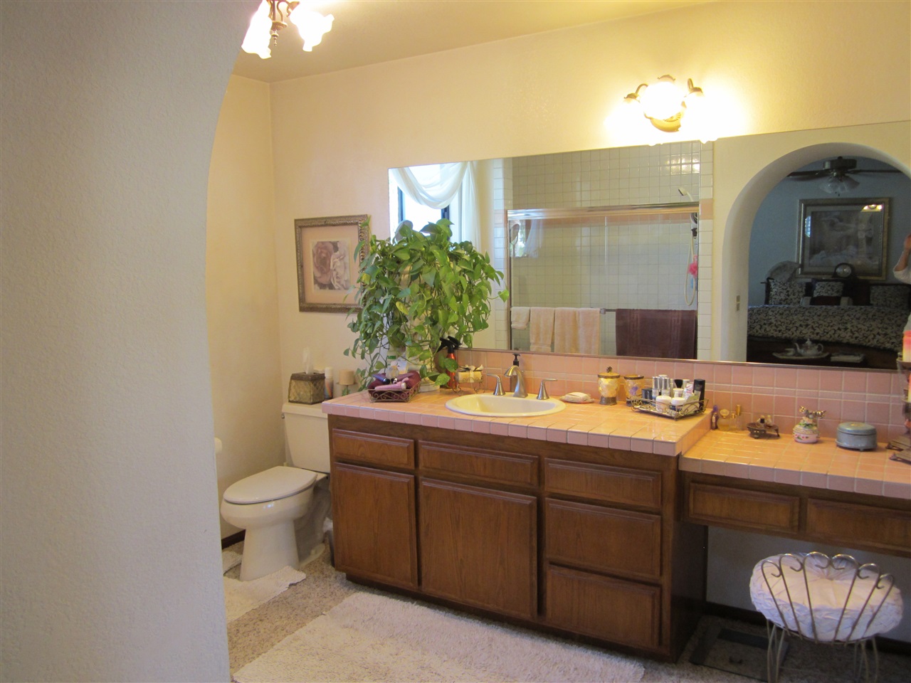 1622 Hackamore Road Oceanside, CA 92057 - Photo 14 of 25 Tub shower combo, sink & vanity area. Large walk-in closet.