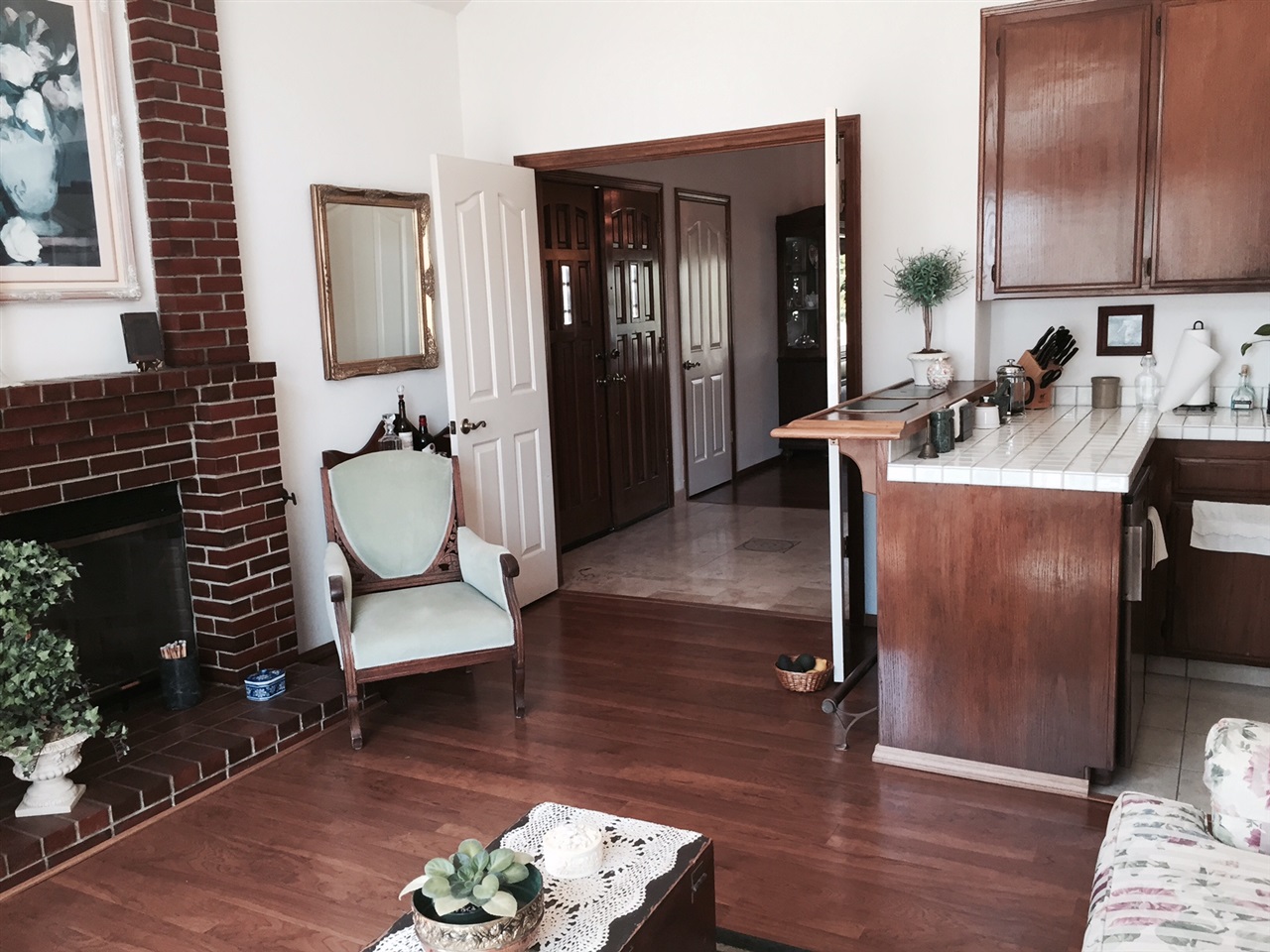 1622 Hackamore Road Oceanside, CA 92057 - Photo 5 of 25 Fireplace, wood floors & wet bar. This room also doubles as the of granny flat living room.