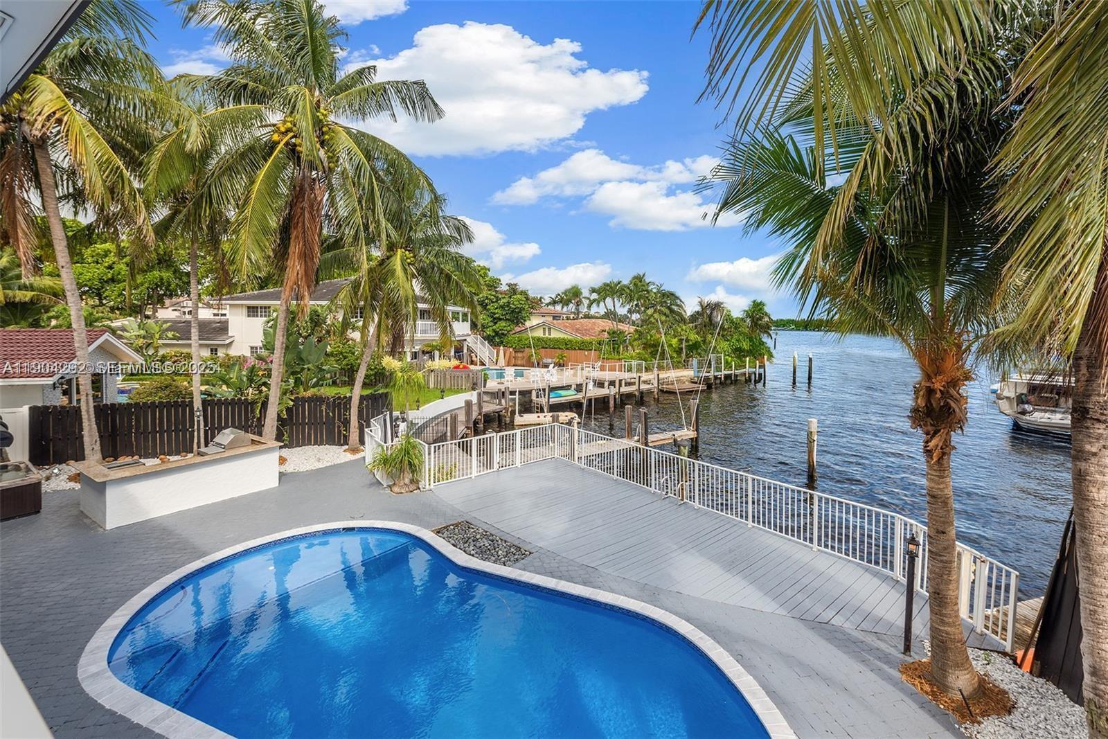 2445 Southeast 8th Street Pompano Beach, FL 33062 - Photo 5 of 42 an outdoor view with patio