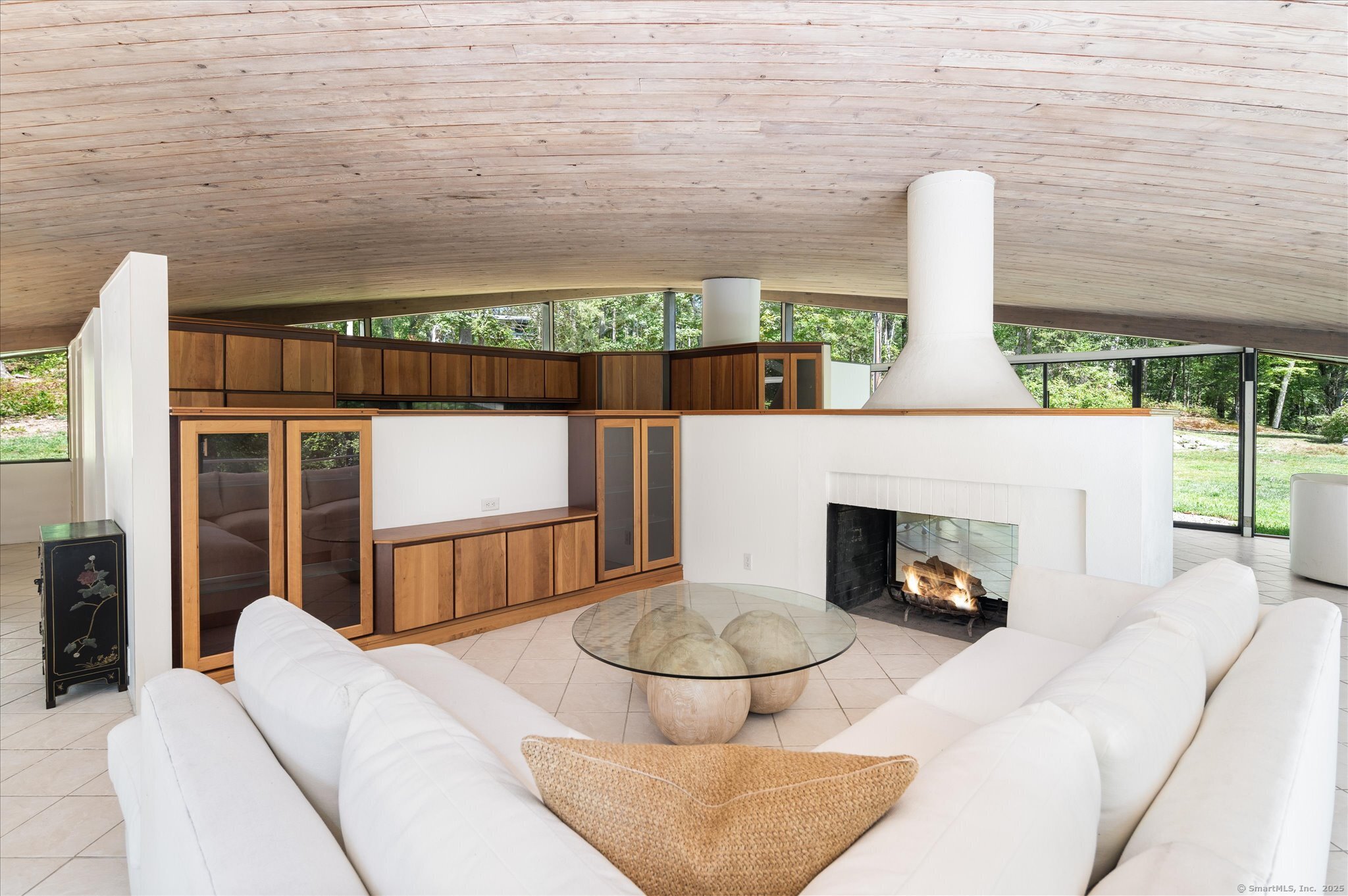 44 Benedict Hill Road New Canaan, CT 06840 - Photo 12 of 27 a living room with furniture and a fireplace