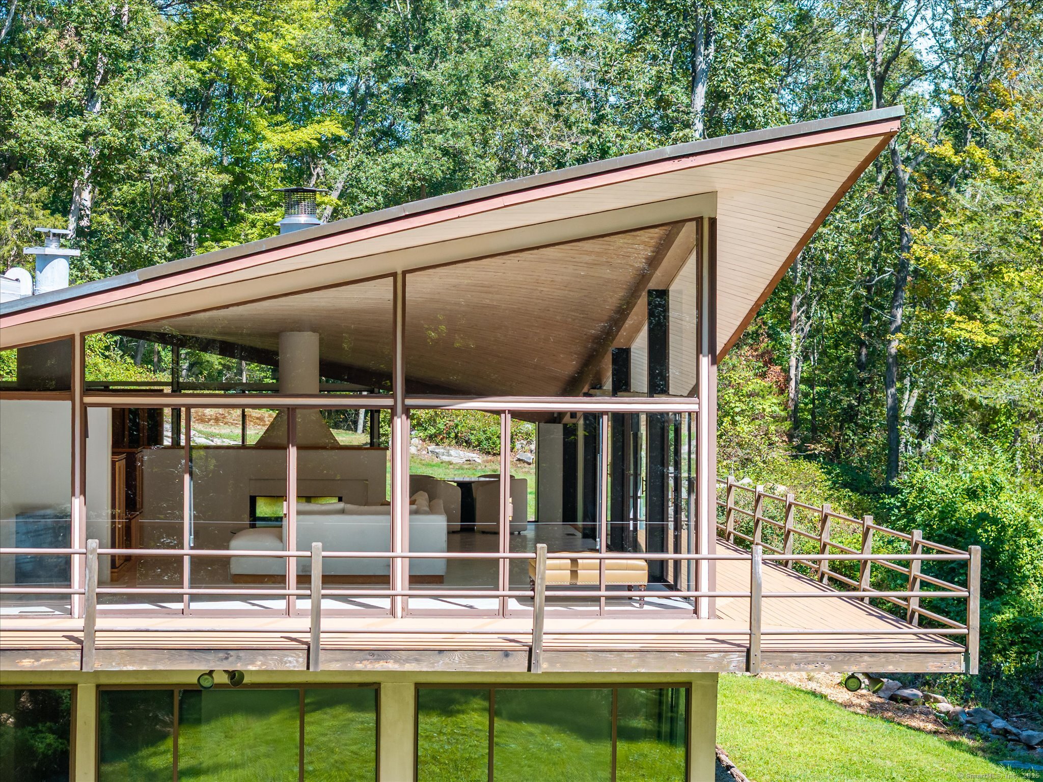 44 Benedict Hill Road New Canaan, CT 06840 - Photo 24 of 27 a view of house with a big yard and potted plants