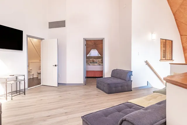 a view of livingroom with furniture and windows