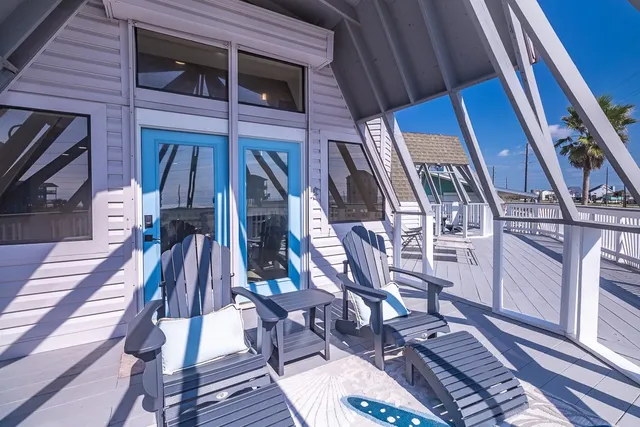 a view of a roof deck with couches