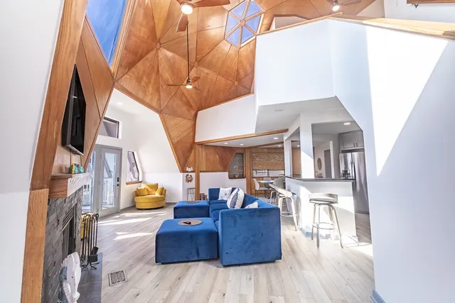 a room with a stove and a refrigerator