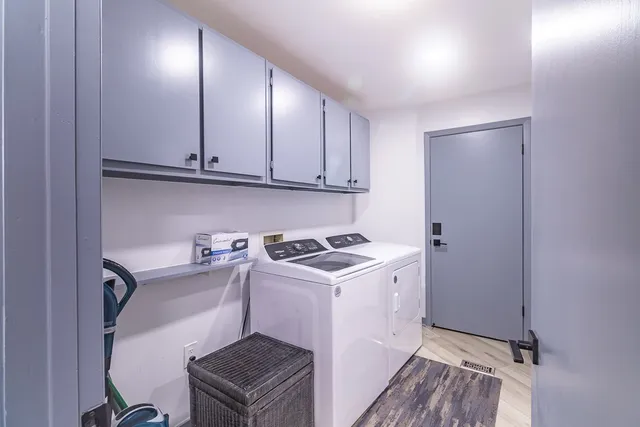 a bathroom with a shower and toilet