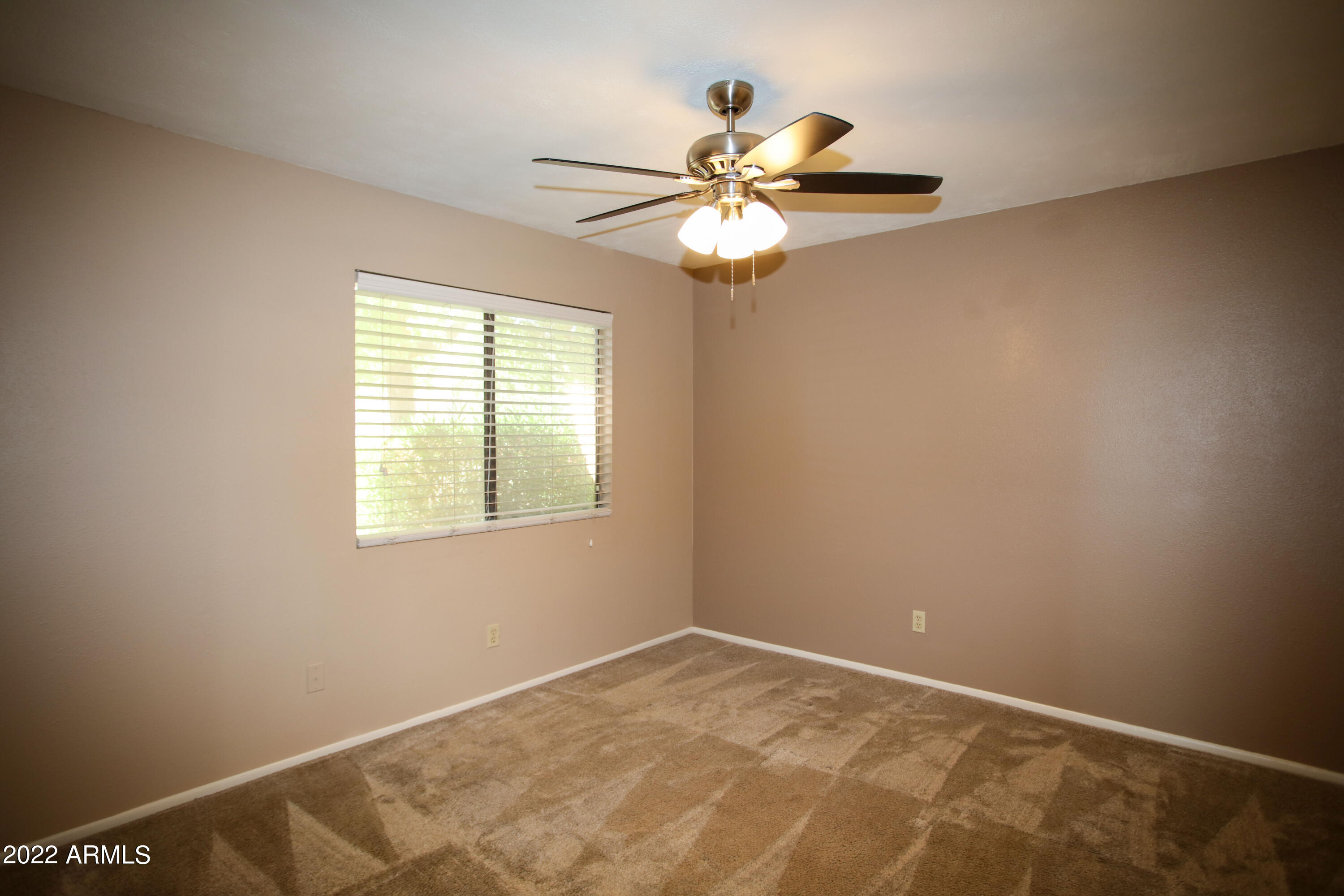 3511 East Baseline Road, Unit 1159 Phoenix, AZ 85042 - Photo 17 of 33 a view of an empty room with a window