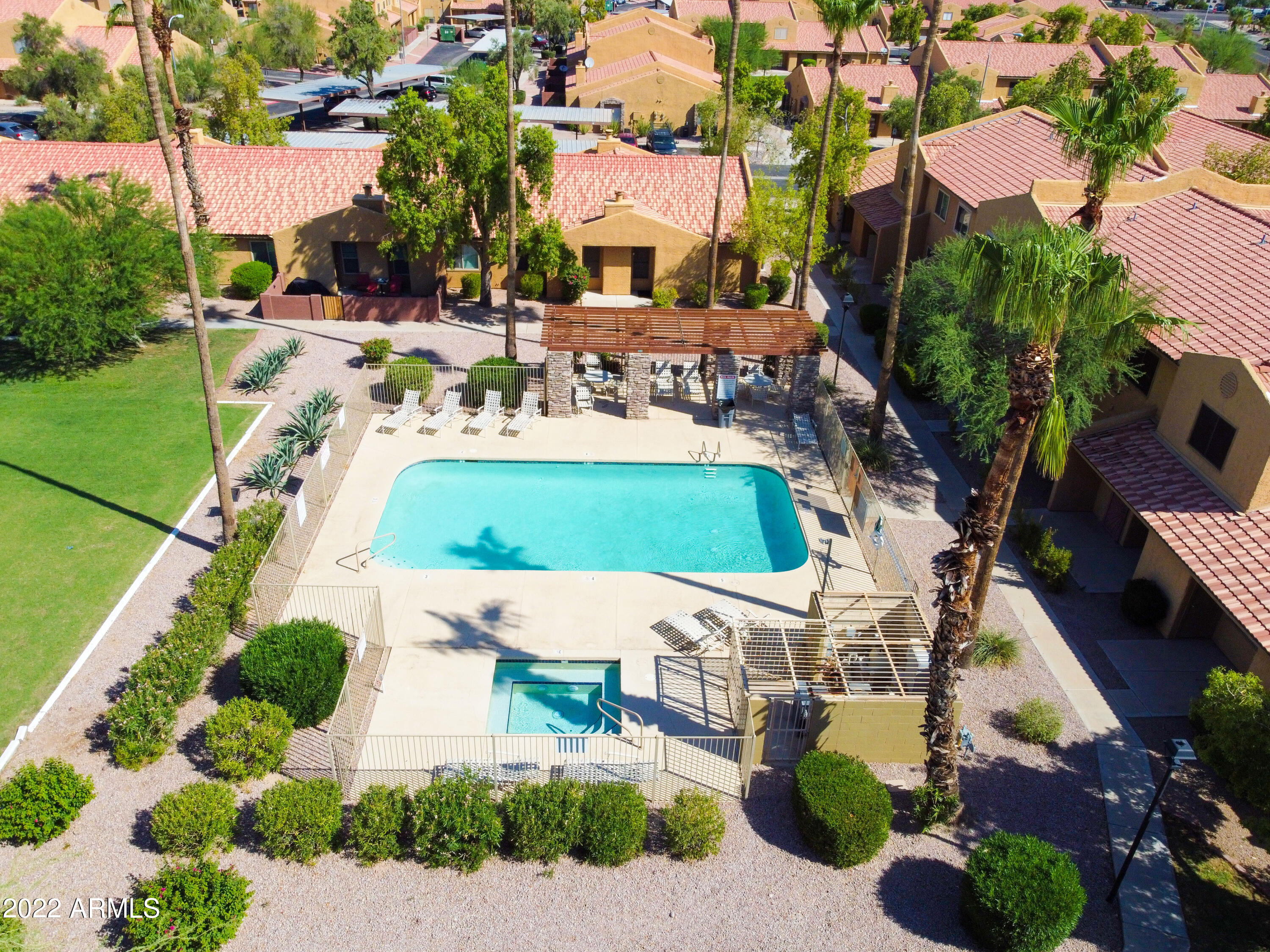 3511 East Baseline Road, Unit 1159 Phoenix, AZ 85042 - Photo 31 of 33 an aerial view of a house with yard swimming pool and outdoor seating