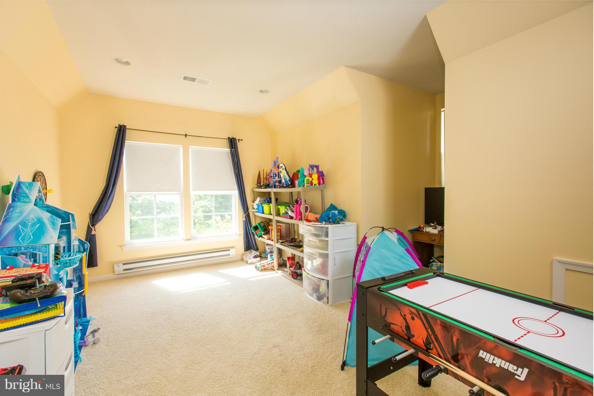 12403 Rochester Park Court Bristow, VA 20136 - Photo 21 of 30 a workspace with furniture and a window