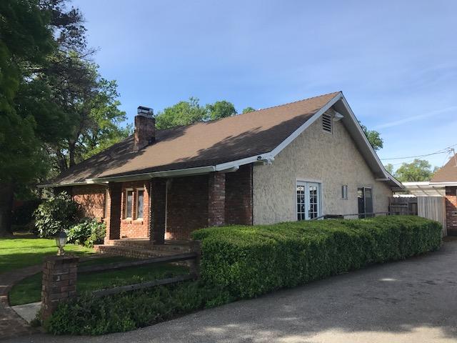 5730 Cedars Road Redding, CA 96001 - Photo 1 of 14 a view of a house with a yard