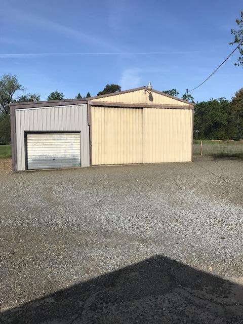 5730 Cedars Road Redding, CA 96001 - Photo 12 of 14 a view of an empty room with a window