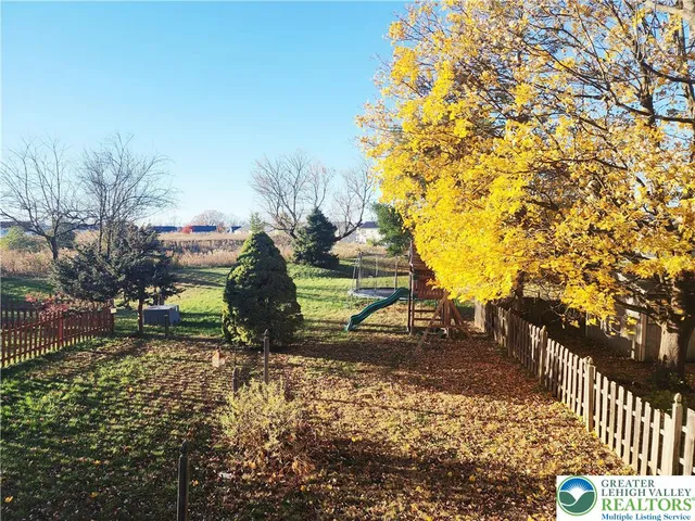 a view of a park with swings