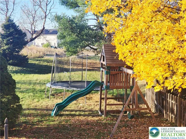 a view of a garden with a bench
