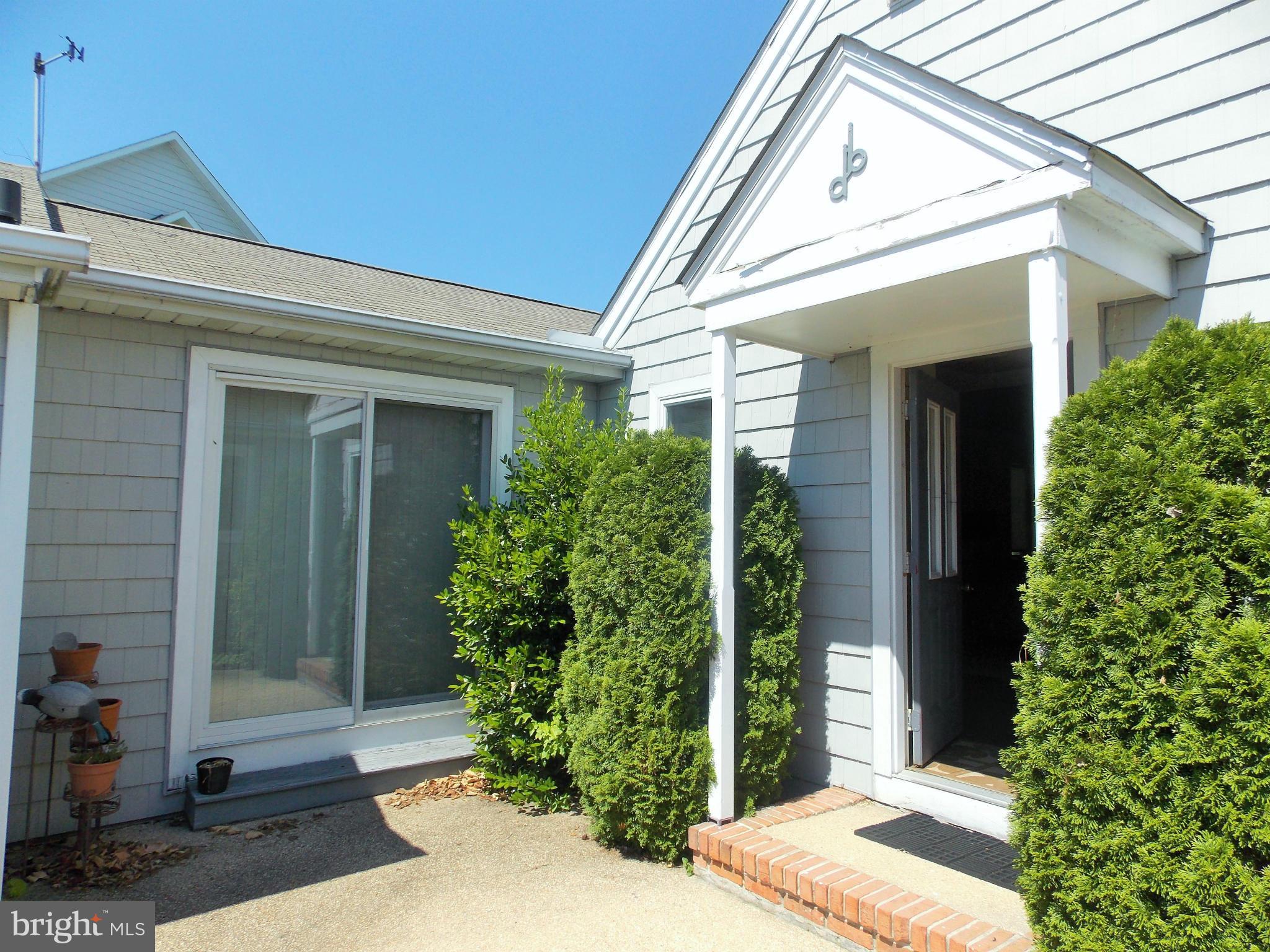 910 Long Point Road Grasonville, MD 21638 - Photo 22 of 29 Private Court Yard and Entrance to 3rd Bedroom