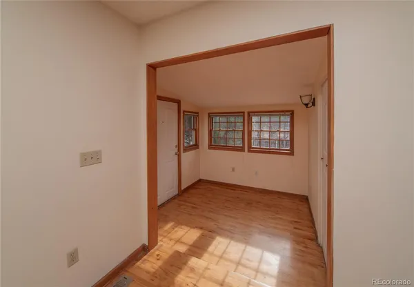 an empty room with windows