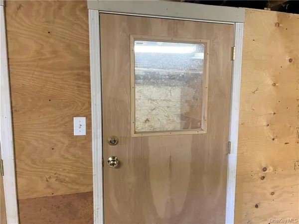 a house with trees in the background