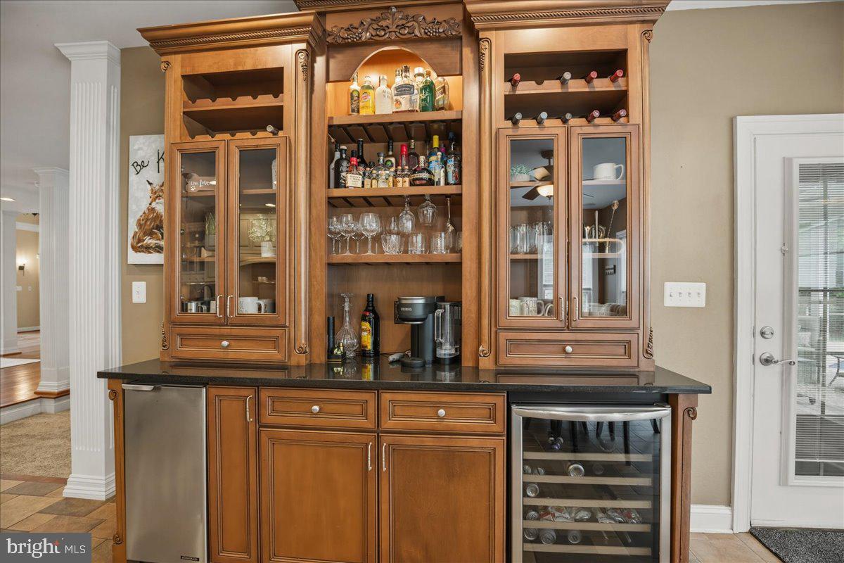 4100 Hidden Creek Road Port Republic, MD 20676 - Photo 46 of 99 Custom beverage bar is convenient to the pool