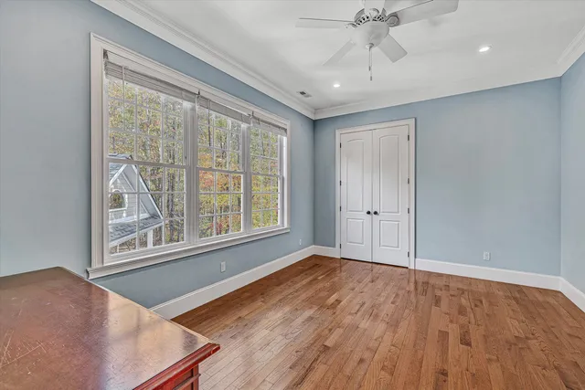 a bathroom with a double vanity sink mirror and bathtub