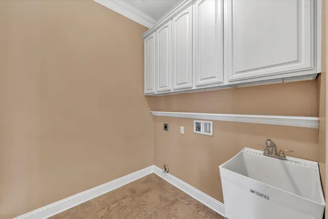 a view of a room with rack on the wall and a window