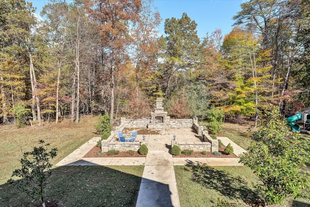 a view of livingroom with hardwood floor and a ceiling fan