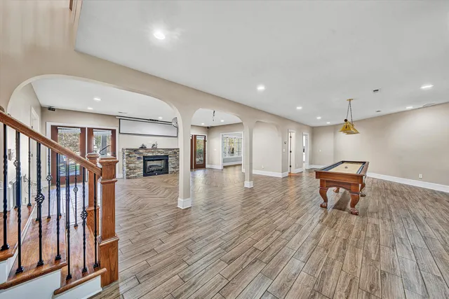 a view of a house with backyard porch and sitting area