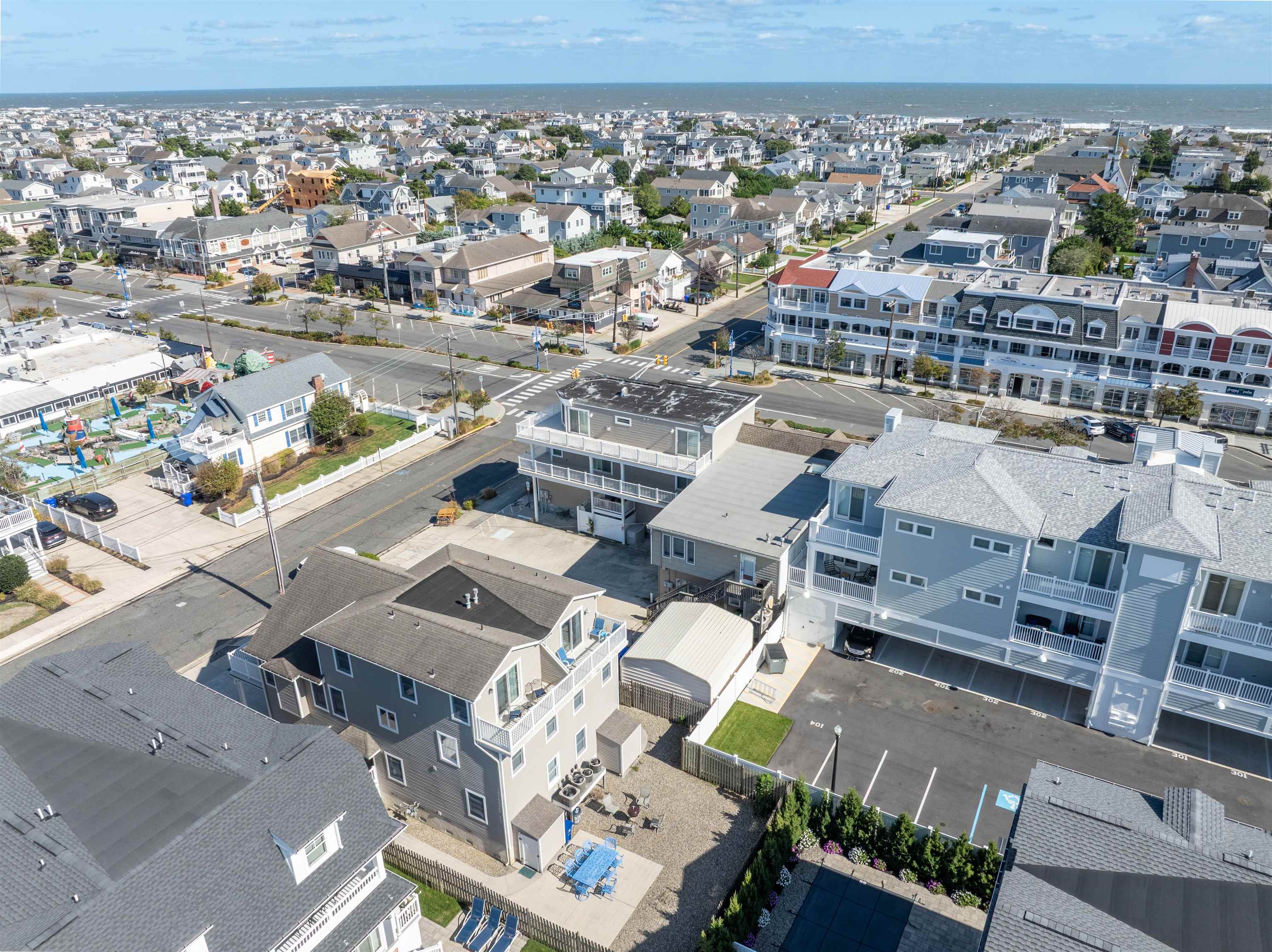 212 25th Street, Unit END Avalon, NJ 08202 - Photo 25 of 34 an aerial view of a building with garden space and ocean view