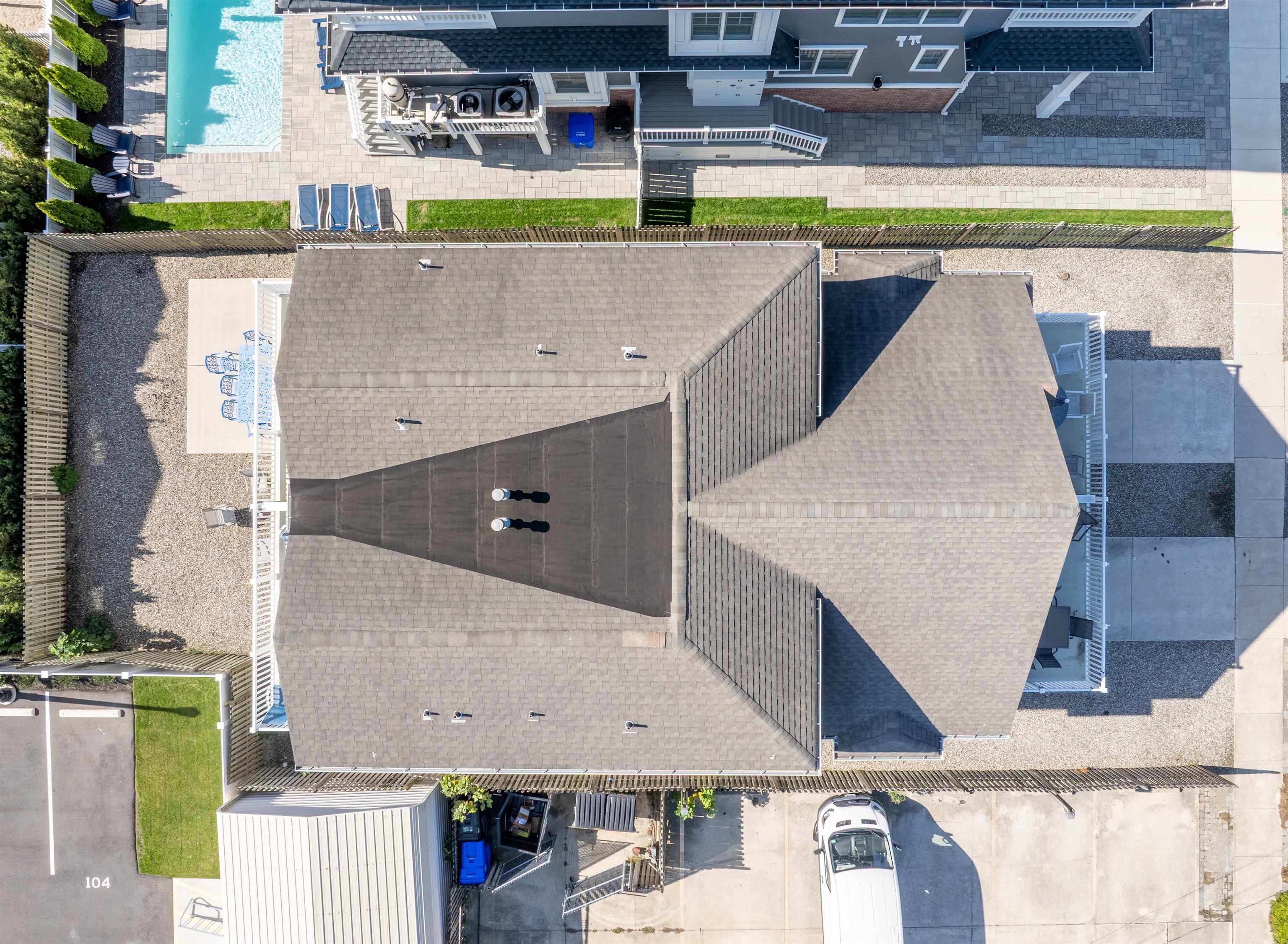 212 25th Street, Unit END Avalon, NJ 08202 - Photo 31 of 34 a view of a kitchen with a outdoor seating area