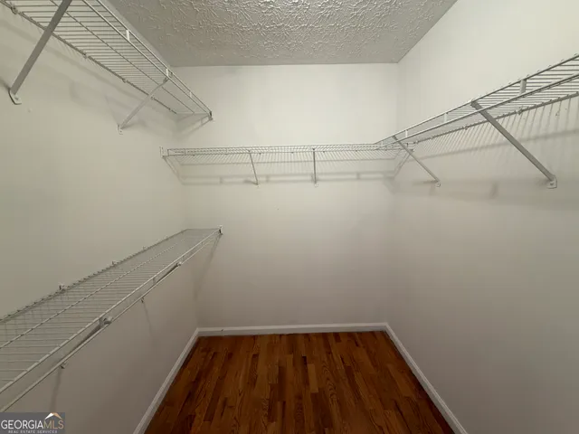 a view of a room with racks on the wall