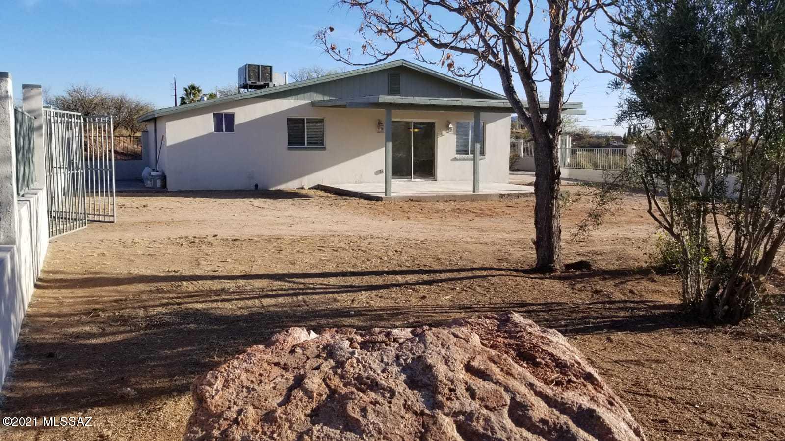 897 Via Savalza Rio Rico, AZ 85648 - Photo 8 of 27 a view of a house with a yard