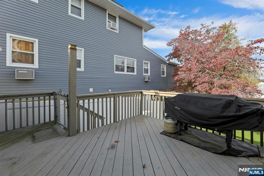 609 Chase Avenue Lyndhurst, NJ 07071 - Photo 26 of 30 a backyard of a house with table and chairs