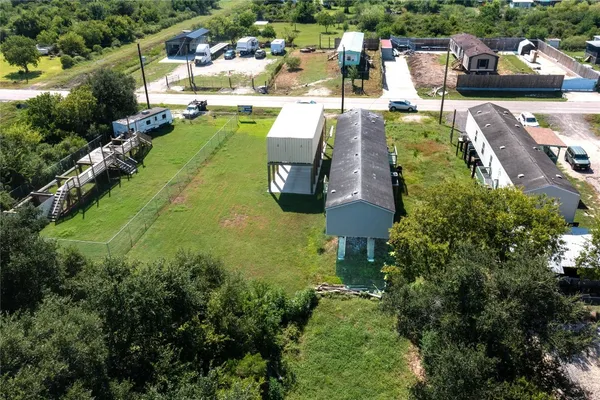an aerial view of a house with a garden