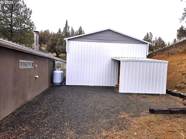 a house view with a backyard space