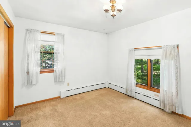 an empty room with windows