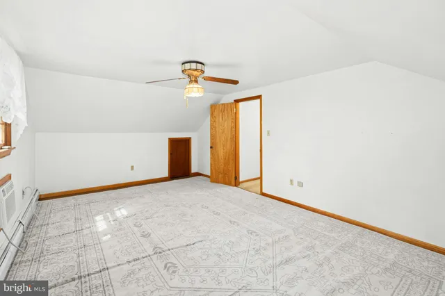 a view of a room with a window