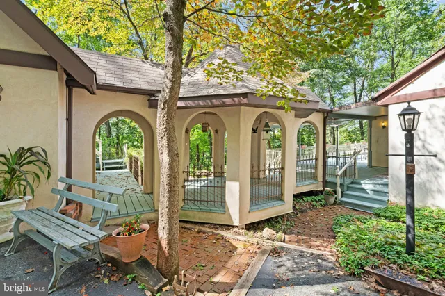 a view of a garage with a tree