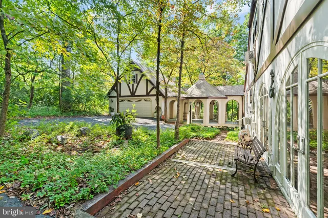 a view of a porch with a garden