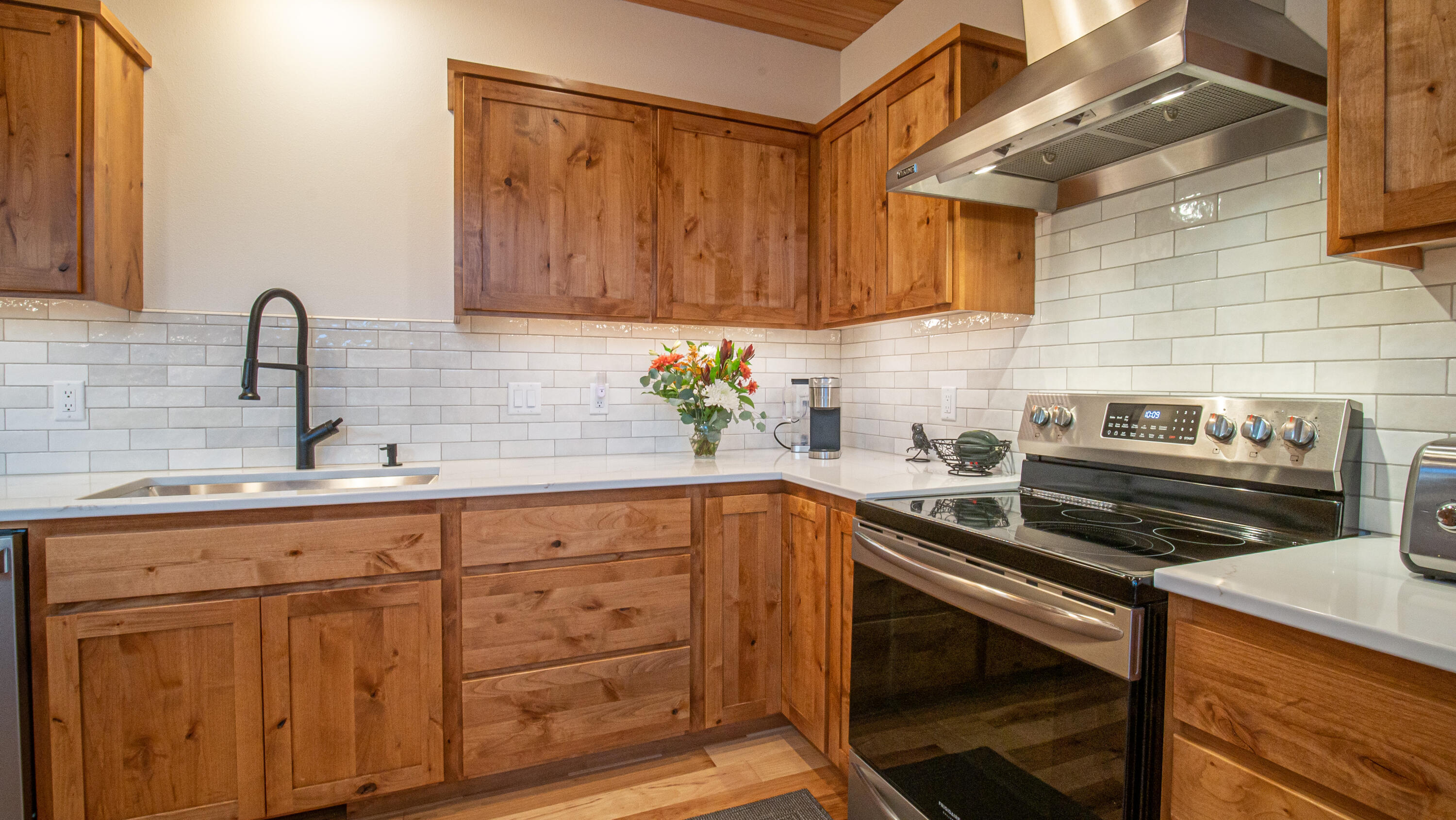 17201 Bakersfield Road Bend, OR 97707 - Photo 15 of 57 Pure wood cabinets and subway tile backsplash