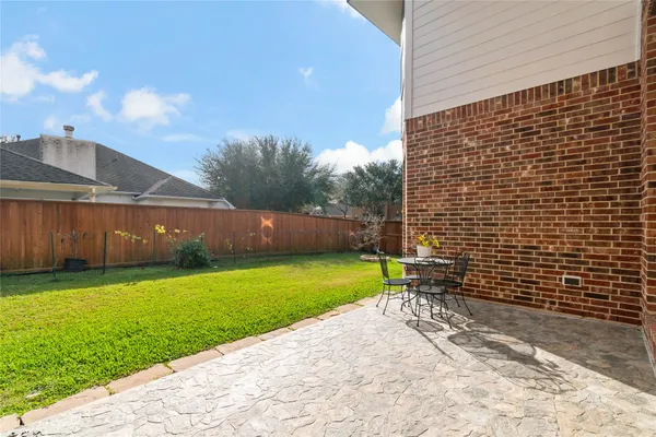 a view of yard and porch with seating space